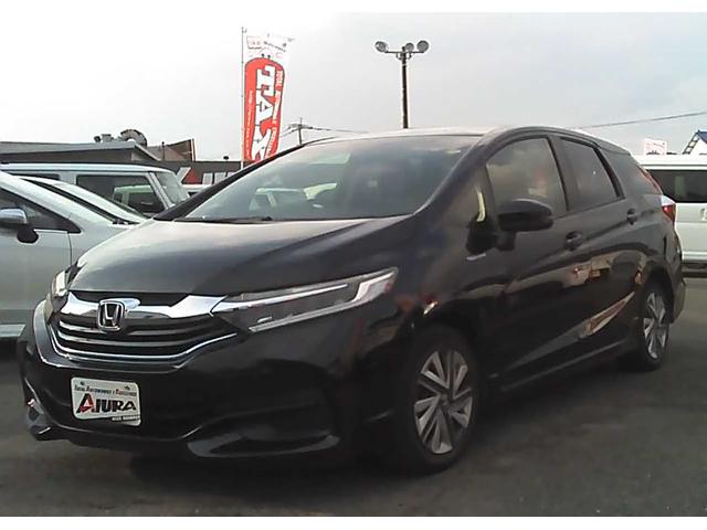 フィットハイブリッド シャトルハイブリッド　スマートキー　社外ナビ　ワンセグＴＶ　ＥＴＣ　バックカメラ　横滑り防止装置　衝突被害軽減ブレーキ　盗難防止装置　アイドリングストップ　電動格納ミラー　オートライト　オートエアコン（2枚目）