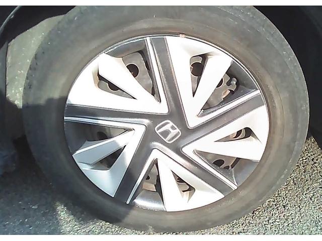 フィットハイブリッド シャトルハイブリッド　スマートキー　社外ナビ　ワンセグＴＶ　ＥＴＣ　バックカメラ　横滑り防止装置　衝突被害軽減ブレーキ　盗難防止装置　アイドリングストップ　電動格納ミラー　オートライト　オートエアコン（5枚目）