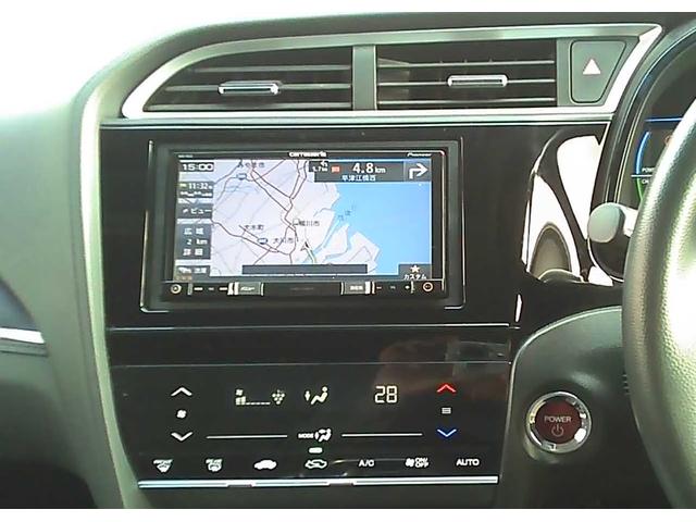 フィットハイブリッド シャトルハイブリッド　スマートキー　社外ナビ　ワンセグＴＶ　ＥＴＣ　バックカメラ　横滑り防止装置　衝突被害軽減ブレーキ　盗難防止装置　アイドリングストップ　電動格納ミラー　オートライト　オートエアコン（11枚目）