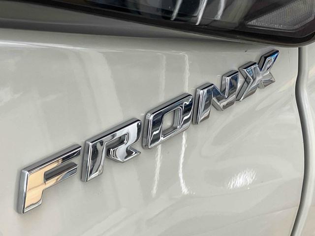 フロンクス ベースグレード　届出済未使用車　元展示車　全方位モニター付メモリー９インチメモリーナビ　ＴＶ　クリアランスソナー　オートクルーズコントロール　レーンアシスト　衝突被害軽減システム　ＬＥＤヘッドランプ　アルミホイール（22枚目）