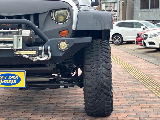 ジープ・ラングラーアンリミテッド スポーツ　リフトアップ　バンパーガード　新品スタットレスタイヤ付　新品チェーン　純正アルミ　電動ウインチ　ＲＯＵＧＨ　ＣＯＵＮＴＲＹサスペンション　オーバーフェンダー　ＬＥＤライト　ＥＴＣ（6枚目）