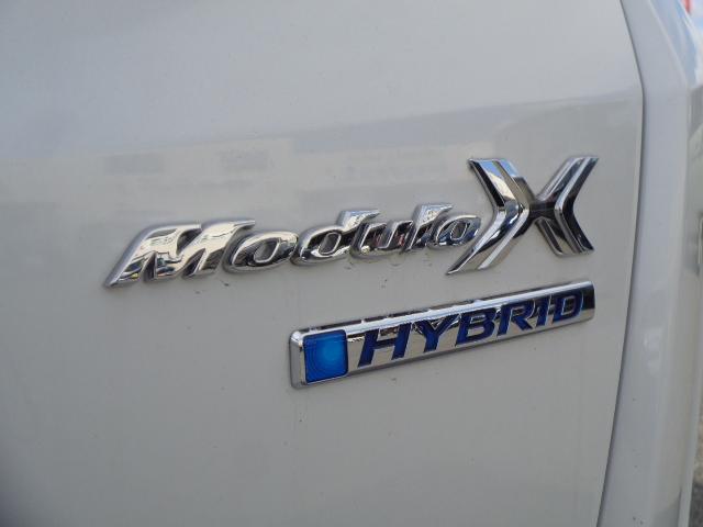 フリードハイブリッド ハイブリッド・モデューロＸ　ホンダセンシング　純正９インチフルセグナビ　ＤＶＤ　ＢＴ　Ｃａｒｐｌａｙ　バックカメラ　両側パワスラ　ＥＴＣ　前後ドラレコ　ハーフレザー　ホンダセンシング　専用シート・ＡＷ　ＬＥＤヘッドレーダークルーズ（13枚目）