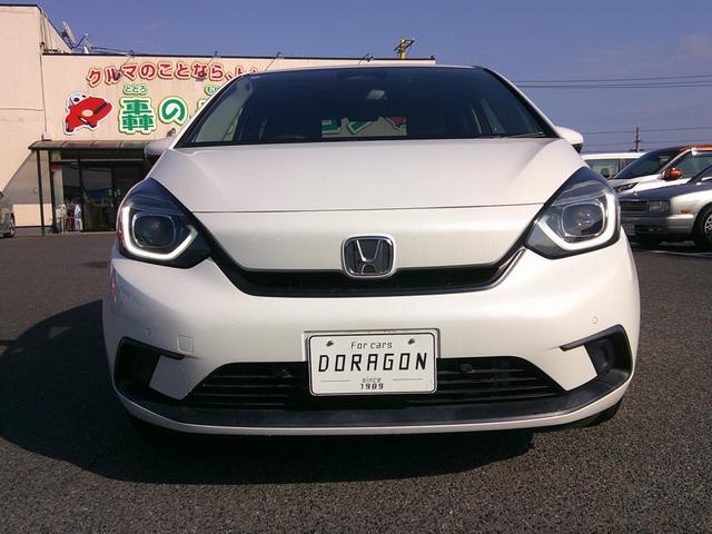 フィット ベーシック　純正ナビ　Ｂｌｕｅｔｏｏｔｈ　バックカメラ　前後ドラレコ　スマートキー×２　オートＬＥＤヘッド　クルーズコントロール　ビルトインＥＴＣ　電動パーキング　パーキングソナー　ステリモ（3枚目）