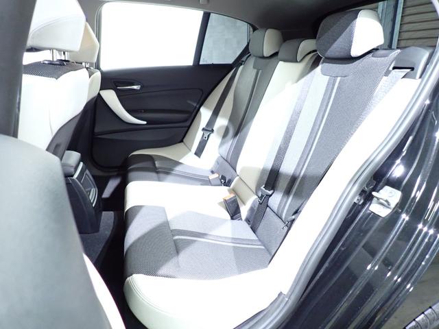 1シリーズ 118i スタイル 禁煙/インテリジェントセーフティー/純正HDDナビ/バックカメラ/フルセグテレビチューナー/Bluetooth/白黒ハーフレザーシート/LEDヘッドライト/ETC/DVD再生/クルーズコントロール(19枚目)