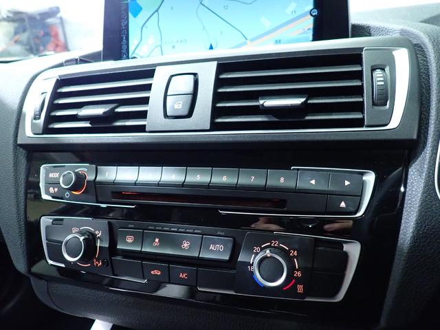 1シリーズ 118i スタイル 禁煙/インテリジェントセーフティー/純正HDDナビ/バックカメラ/フルセグテレビチューナー/Bluetooth/白黒ハーフレザーシート/LEDヘッドライト/ETC/DVD再生/クルーズコントロール(29枚目)