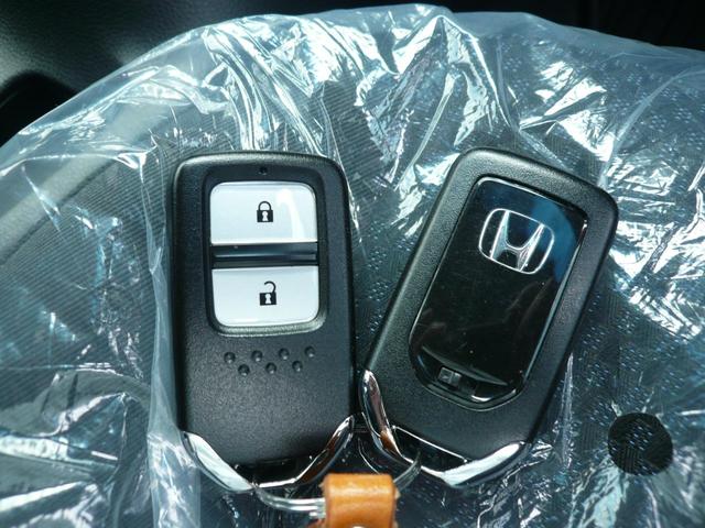 フィット 13G・S ホンダセンシング 純正インターナビ Bluetooth接続可 BカメラフロアCVT エアコン(プラズマクラスター)AW15ステアリングスイッチ クルコン スマートキー Pスタパドルシフト ドラレコ ETC 整備記録簿(14枚目)