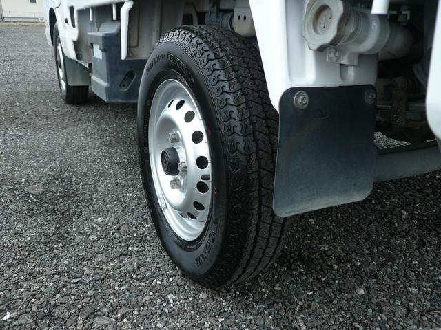 アクティトラック SDX フルタイム4WD(切り替えスイッチなし・自動切り替え)エアコンフロア5F パワステ パワーウィンドウ カーラジオ 取扱説明書運転席エアバック はね上げ機構付助手席 荷台作業灯付き 三方開(32枚目)