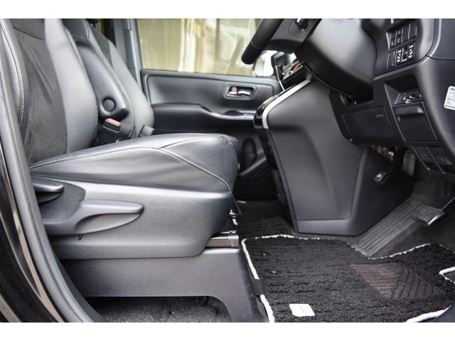 ヴォクシー ZS 煌III 9インチ純正ナビ TV ブルートゥース 純正リヤモニター バックカメラ ETC パーキングセンサー デュアルオートエアコン シートバックテーブル ロールサンシェード 両側パワースライド USBポート(57枚目)