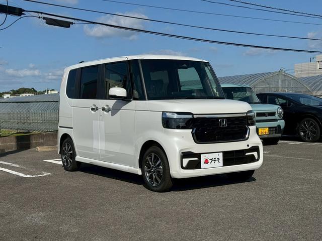 N-BOXカスタム ベースグレード 両側スライド・片側電動 クリアランスソナー オートクルーズコントロール レーンアシスト 衝突被害軽減システム オートライト LEDヘッドランプ スマートキー アイドリングストップ 電動格納ミラー(3枚目)