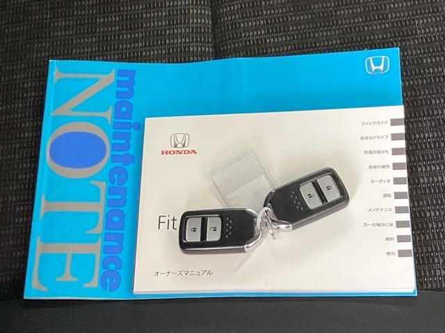 フィット １３Ｇ・Ｆパッケージ　純正メモリーナビワンセグＥＴＣ　エコモード　運転席助手席エアバック　記録簿付き　カーテンエアバッグ　１セグＴＶ　イモビ　マニュアルエアコン　スマートキーシステム　ナビ＆ＴＶ　ＡＢＳ　横滑り防止システム（19枚目）