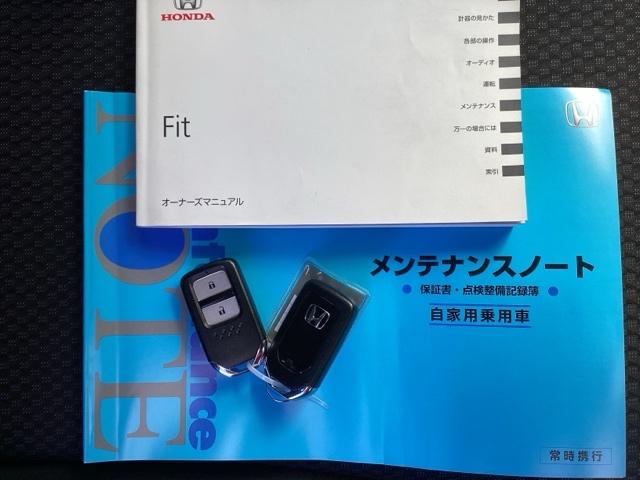 フィット １３Ｇ・Ｆ　純正ナビ　フルセグ　リアカメラ　リヤカメラ　地デジ　イモビライザー　助手席エアバック　キーレス　ＡＡＣ　パワーウィンドー　スマートキ－　パワステ　ＵＳＢ　運転席エアバッグ　ＤＶＤ　横滑防止装置　ＡＢＳ（24枚目）