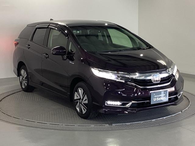 シャトル ハイブリッドXホンダセンシング 純正メモリーナビ リアカメラ ETC 衝突軽減装置 Rカメラ Fセグ LEDヘッド ECON AAC USB 盗難防止装置 記録簿 DVD再生 シートヒーター スマートキー エアバッグ 4WD ABS(7枚目)