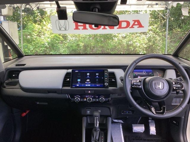 フィット e:HEVRS 試乗車 メモリーナビ ドラレコ ETC エアバッグ ナビ&TV パワーウィンドウ 助手席エアバッグ Dレコ フルセグテレビ LEDヘッドランプ セキュリティアラーム フルオートエアコン 禁煙 USB(2枚目)