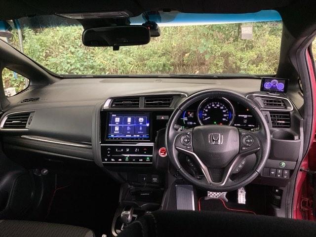 フィットハイブリッド Ｓホンダセンシング　純正メモリーナビ　ドラレコ　リアカメラ　スマ－トキ－　ナビＴＶ　アクティブクルーズコントロール　パワーウインドウ　ドライブレコーダ　サイドエアバック　ＤＶＤ再生　パワーステアリング　整備記録簿　ＡＢＳ（2枚目）