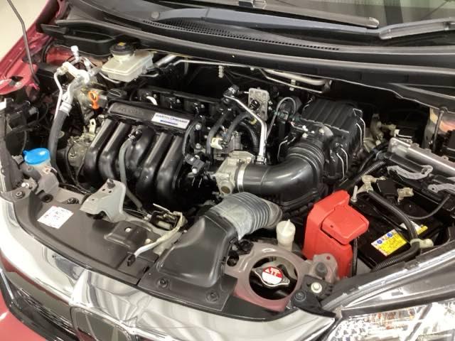 フィットハイブリッド Ｓホンダセンシング　純正メモリーナビ　ドラレコ　リアカメラ　スマ－トキ－　ナビＴＶ　アクティブクルーズコントロール　パワーウインドウ　ドライブレコーダ　サイドエアバック　ＤＶＤ再生　パワーステアリング　整備記録簿　ＡＢＳ（20枚目）