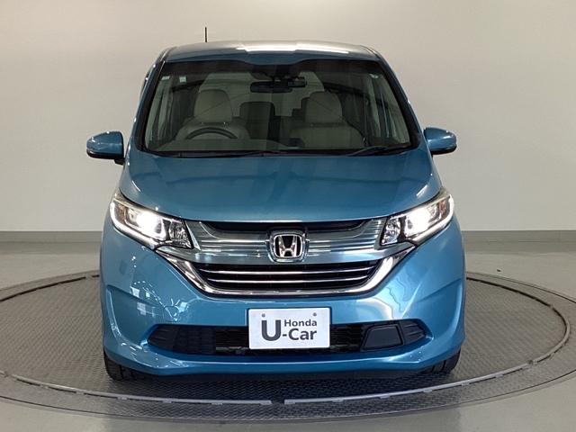 フリードハイブリッド ハイブリッド・Ｇホンダセンシング　ナビ　フルセグ　リヤカメラ　軽減ブレーキ　キーフリーシステム　記録簿　ＤＶＤ再生可能　ＥＣＯＮ　禁煙　後カメラ　Ａクルーズ　ＬＥＤヘッドランプ　横滑防止　ドライブレコーダ　パワーウインドウ　３列シート（6枚目）