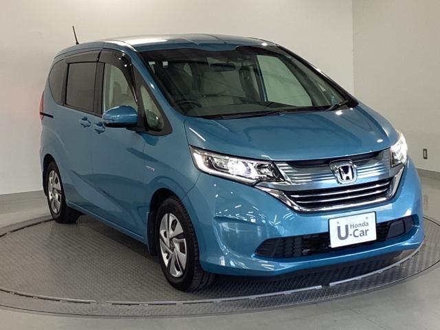 フリードハイブリッド ハイブリッド・Ｇホンダセンシング　ナビ　フルセグ　リヤカメラ　軽減ブレーキ　キーフリーシステム　記録簿　ＤＶＤ再生可能　ＥＣＯＮ　禁煙　後カメラ　Ａクルーズ　ＬＥＤヘッドランプ　横滑防止　ドライブレコーダ　パワーウインドウ　３列シート（7枚目）