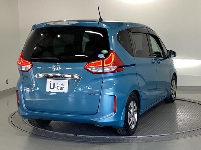 フリードハイブリッド ハイブリッド・Ｇホンダセンシング　ナビ　フルセグ　リヤカメラ　軽減ブレーキ　キーフリーシステム　記録簿　ＤＶＤ再生可能　ＥＣＯＮ　禁煙　後カメラ　Ａクルーズ　ＬＥＤヘッドランプ　横滑防止　ドライブレコーダ　パワーウインドウ　３列シート（8枚目）