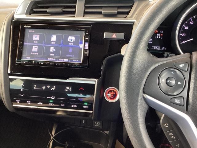 フィットハイブリッド Fコンフォートエディション 純正ナビ フルセグ リアカメラ セキュリティアラーム USB接続 スマキー ETC車載器 リヤカメラ 横滑り防止機能 地デジ LEDヘッド ABS エアバッグ パワーウインドウ アイドリングストップ(2枚目)