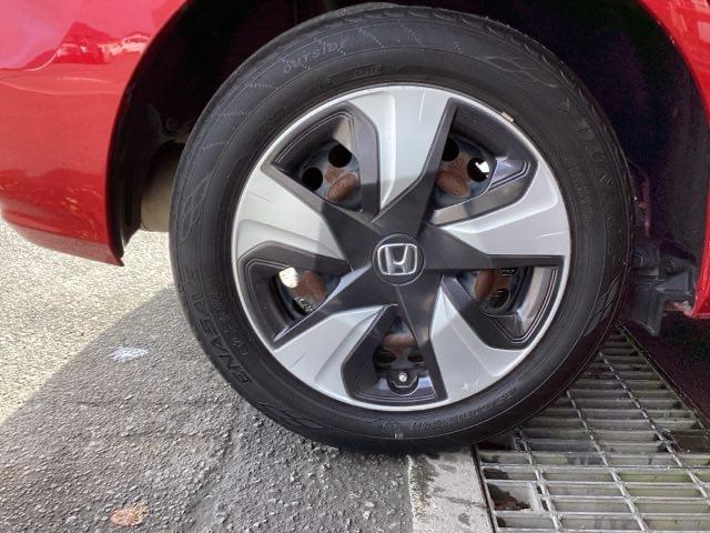 フィットハイブリッド Fコンフォートエディション 純正ナビ フルセグ リアカメラ セキュリティアラーム USB接続 スマキー ETC車載器 リヤカメラ 横滑り防止機能 地デジ LEDヘッド ABS エアバッグ パワーウインドウ アイドリングストップ(25枚目)