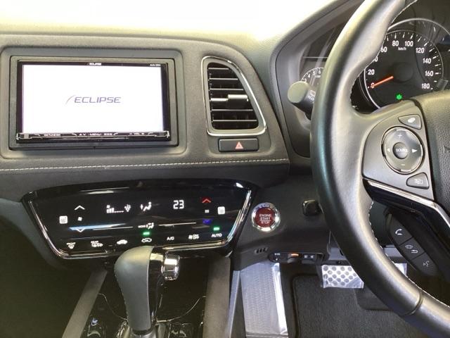 ヴェゼル ＲＳ・ホンダセンシング　メモリーナビ　リアカメラ　ＥＴＣ　盗難防止　バックモニター　サイドエアバック　スマ－トキ－　シートヒータ　ＬＥＤライト　地デジＴＶ　フルオートエアコン　整備記録簿　ＤＶＤ　横滑り防止機能　ナビ＆ＴＶ（3枚目）