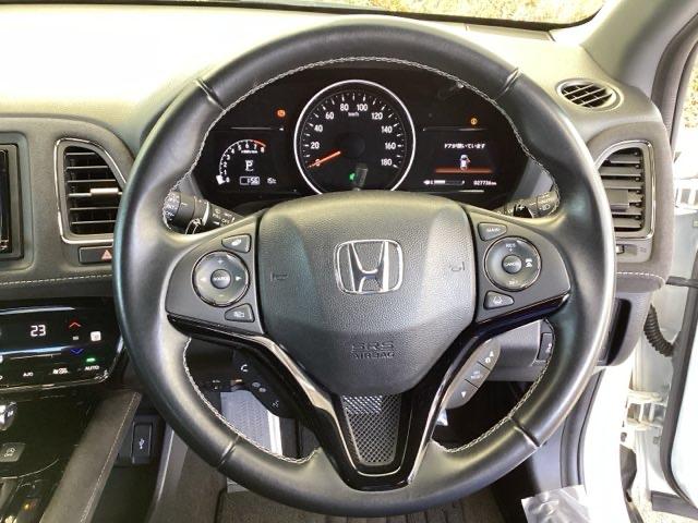 ヴェゼル ＲＳ・ホンダセンシング　メモリーナビ　リアカメラ　ＥＴＣ　盗難防止　バックモニター　サイドエアバック　スマ－トキ－　シートヒータ　ＬＥＤライト　地デジＴＶ　フルオートエアコン　整備記録簿　ＤＶＤ　横滑り防止機能　ナビ＆ＴＶ（14枚目）