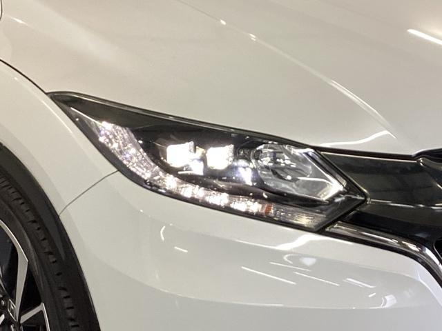 ヴェゼル ＲＳ・ホンダセンシング　メモリーナビ　リアカメラ　ＥＴＣ　盗難防止　バックモニター　サイドエアバック　スマ－トキ－　シートヒータ　ＬＥＤライト　地デジＴＶ　フルオートエアコン　整備記録簿　ＤＶＤ　横滑り防止機能　ナビ＆ＴＶ（22枚目）