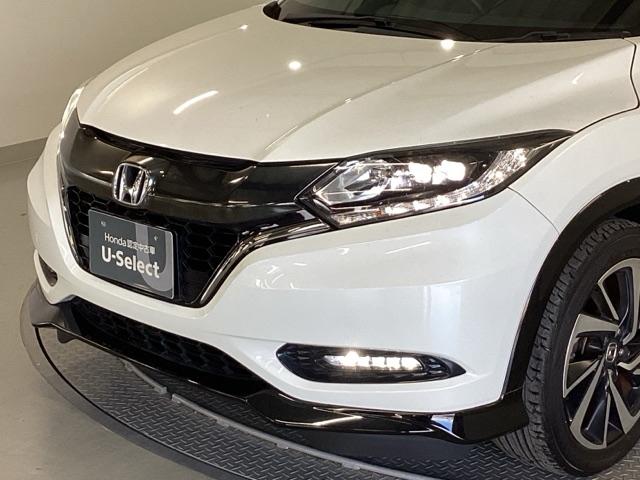 ヴェゼル ＲＳ・ホンダセンシング　メモリーナビ　リアカメラ　ＥＴＣ　盗難防止　バックモニター　サイドエアバック　スマ－トキ－　シートヒータ　ＬＥＤライト　地デジＴＶ　フルオートエアコン　整備記録簿　ＤＶＤ　横滑り防止機能　ナビ＆ＴＶ（25枚目）