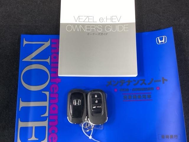 ヴェゼル ｅ：ＨＥＶＺ　純正ナビ　フルセグ　リアカメラ　衝突回避支援ブレーキ機能　スマキ　Ｐトランク　フルオートエアコン　Ｄレコ　エアバッグ　両席エアバック　Ｒカメ　パワーウィンドウ　ＬＥＤランプ　ソナー　クルーズＣ　ＵＳＢ（26枚目）