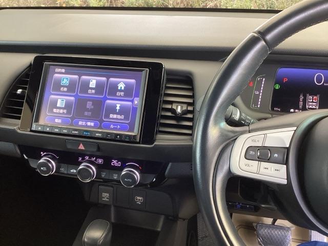 フィット e:HEVホーム 純正ナビ フルセグ リアカメラ 前後誤発進抑制機能 クリソナ 助手席エアバッグ 運転席エアバッグ アイドリングストップ LEDライト USB接続 バックカメラ ABS サイドエアバッグ スマートキー(2枚目)