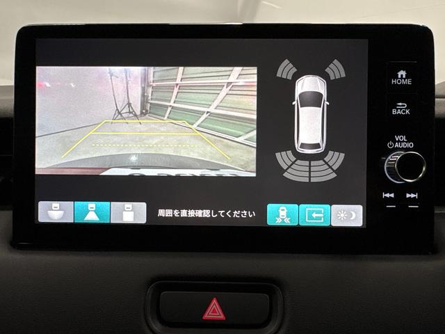 ヴェゼル ｅ：ＨＥＶＺ　ＨｏｎｄａＣＯＮＮＥＣＴディスプレー　ＥＴＣ　前後ドラレコ　ブラインドスポットインフォメーション　後退出庫サポート　ハンズフリーアクセスパワーテールゲート　ワイヤレス充電器　１８インチアルミホイール（7枚目）