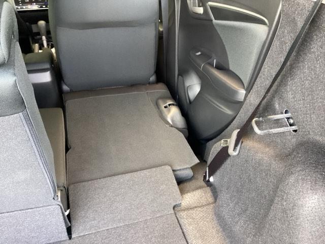 フィット １３Ｇ・Ｌパッケージ　純正ナビ　ワンセグ　リアカメラ　運転席エアバッグ　盗難防止システム　エコアイドリングストップ　キーレス　ＷＡＢ　ＬＥＤヘッド　スマ－トキ－　ＤＶＤ再生可　ＶＳＡ　パワーウィンド　バックモニター　ＡＢＳ（21枚目）