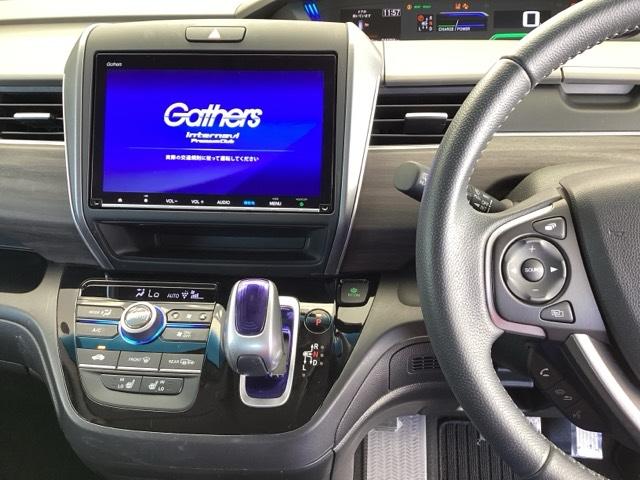 フリードハイブリッド ハイブリッド・ＥＸ　純正メモリーナビ　両側電動スライドドア　地デジフルセグＴＶ　シ－トヒ－タ－　整備記録簿　リヤカメラ　ＬＥＤライト　フルオートエアコン　ＡＢＳ　ＤＶＤ再生可　ウォークスルー　サイドエアバッグ　キーフリー（3枚目）