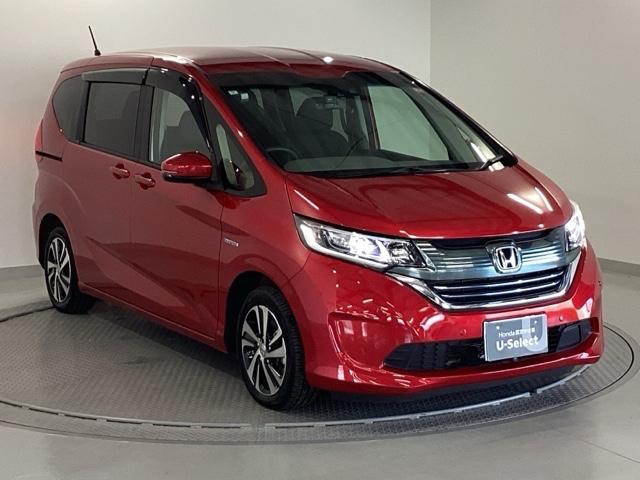 フリードハイブリッド ハイブリッド・ＥＸ　純正メモリーナビ　両側電動スライドドア　地デジフルセグＴＶ　シ－トヒ－タ－　整備記録簿　リヤカメラ　ＬＥＤライト　フルオートエアコン　ＡＢＳ　ＤＶＤ再生可　ウォークスルー　サイドエアバッグ　キーフリー（7枚目）