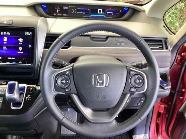 フリードハイブリッド ハイブリッド・ＥＸ　純正メモリーナビ　両側電動スライドドア　地デジフルセグＴＶ　シ－トヒ－タ－　整備記録簿　リヤカメラ　ＬＥＤライト　フルオートエアコン　ＡＢＳ　ＤＶＤ再生可　ウォークスルー　サイドエアバッグ　キーフリー（14枚目）