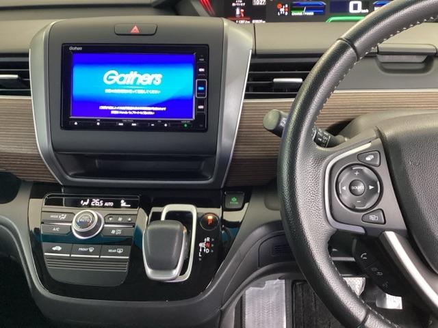 フリード+ハイブリッド ハイブリッド・クロスターホンダセンシング 純正メモリーナビ 両側電動スライドドア バックカメラ ETC 地デジフルセグ 両側電動ドア LEDヘッドライト スマートキー 横滑り防止装置 クルーズコントロール ウォークスルー 整備記録簿 USB(3枚目)