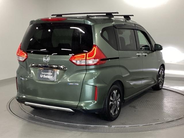 フリード+ハイブリッド ハイブリッド・クロスターホンダセンシング 純正メモリーナビ 両側電動スライドドア バックカメラ ETC 地デジフルセグ 両側電動ドア LEDヘッドライト スマートキー 横滑り防止装置 クルーズコントロール ウォークスルー 整備記録簿 USB(8枚目)
