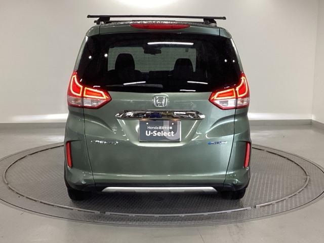 フリード+ハイブリッド ハイブリッド・クロスターホンダセンシング 純正メモリーナビ 両側電動スライドドア バックカメラ ETC 地デジフルセグ 両側電動ドア LEDヘッドライト スマートキー 横滑り防止装置 クルーズコントロール ウォークスルー 整備記録簿 USB(9枚目)