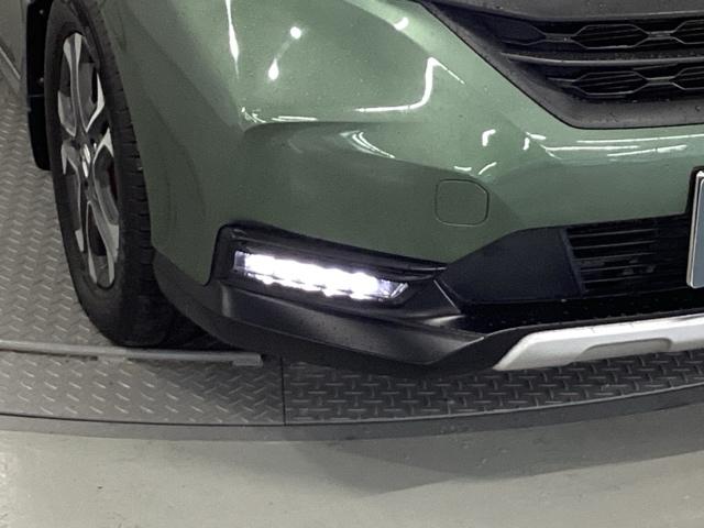 フリード+ハイブリッド ハイブリッド・クロスターホンダセンシング 純正メモリーナビ 両側電動スライドドア バックカメラ ETC 地デジフルセグ 両側電動ドア LEDヘッドライト スマートキー 横滑り防止装置 クルーズコントロール ウォークスルー 整備記録簿 USB(24枚目)