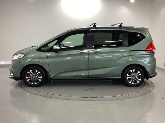 フリード+ハイブリッド ハイブリッド・クロスターホンダセンシング 純正メモリーナビ 両側電動スライドドア バックカメラ ETC 地デジフルセグ 両側電動ドア LEDヘッドライト スマートキー 横滑り防止装置 クルーズコントロール ウォークスルー 整備記録簿 USB(26枚目)