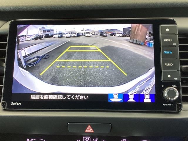 フィット e:HEVホーム 試乗車 メモリーナビ ETC ドラレコ 前後誤発進抑制機能 助手席エアバッグ 運転席エアバッグ アイドリングストップ 禁煙 LEDライト USB接続 バックカメラ ABS サイドエアバッグ DVD再生(12枚目)