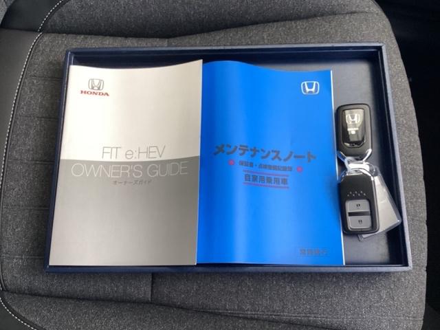 フィット e:HEVホーム 試乗車 メモリーナビ ETC ドラレコ 前後誤発進抑制機能 助手席エアバッグ 運転席エアバッグ アイドリングストップ 禁煙 LEDライト USB接続 バックカメラ ABS サイドエアバッグ DVD再生(21枚目)