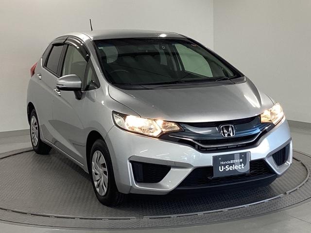 フィット １３Ｇ・Ｆパッケージ　メモリーナビ　ＥＴＣ　イモビ　スマ－トキ－　記録簿有り　ＶＳＡ　助手席エアバッグ　オートエアコン　エアバック　ＰＳ　キ－フリ－　１セグ　ＰＷ　ＡＢＳ　ＴＶナビ　アイドリングＳＴＯＰ（8枚目）