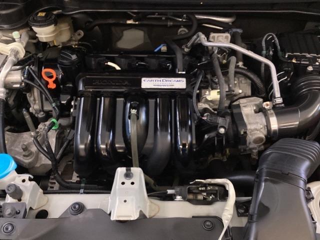 フィット １３Ｇ・Ｆパッケージ　メモリーナビ　ＥＴＣ　イモビ　スマ－トキ－　記録簿有り　ＶＳＡ　助手席エアバッグ　オートエアコン　エアバック　ＰＳ　キ－フリ－　１セグ　ＰＷ　ＡＢＳ　ＴＶナビ　アイドリングＳＴＯＰ（14枚目）