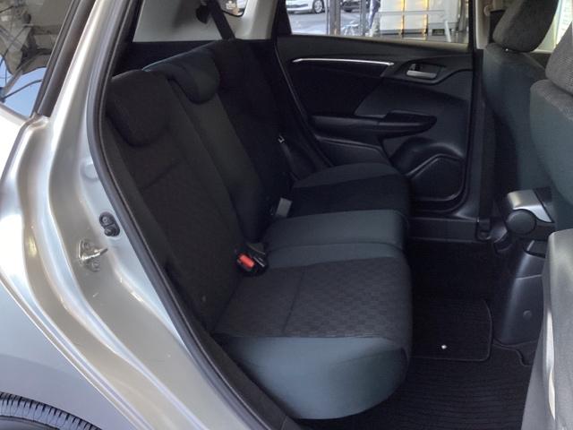 フィット １３Ｇ・Ｆパッケージ　メモリーナビ　ＥＴＣ　イモビ　スマ－トキ－　記録簿有り　ＶＳＡ　助手席エアバッグ　オートエアコン　エアバック　ＰＳ　キ－フリ－　１セグ　ＰＷ　ＡＢＳ　ＴＶナビ　アイドリングＳＴＯＰ（16枚目）