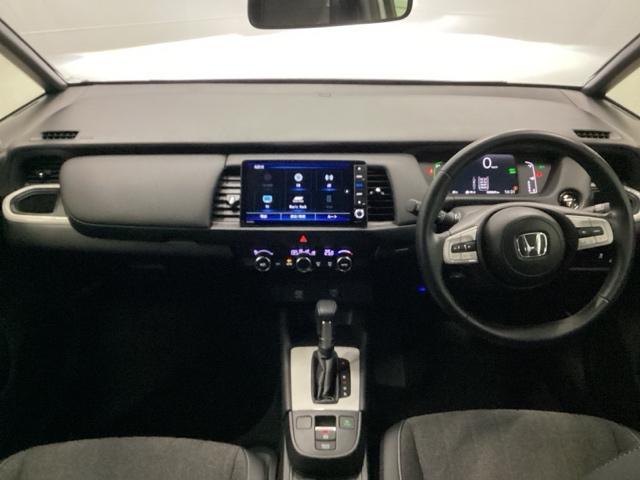 フィット e:HEVホーム 試乗車 メモリーナビ ドラレコ ETC 前後誤発進抑制機能 クリソナ 助手席エアバッグ 運転席エアバッグ アイドリングストップ 禁煙 LEDライト USB接続 バックカメラ ABS サイドエアバッグ(2枚目)