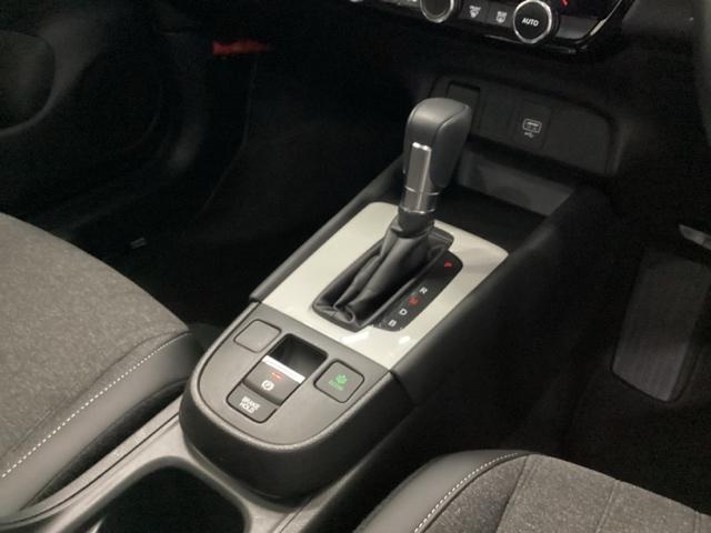 フィット e:HEVホーム 試乗車 メモリーナビ ドラレコ ETC 前後誤発進抑制機能 クリソナ 助手席エアバッグ 運転席エアバッグ アイドリングストップ 禁煙 LEDライト USB接続 バックカメラ ABS サイドエアバッグ(15枚目)