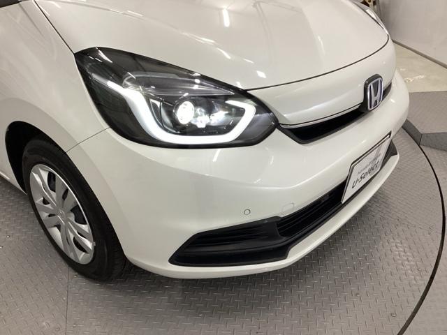 フィット e:HEVホーム 試乗車 メモリーナビ ドラレコ ETC 前後誤発進抑制機能 クリソナ 助手席エアバッグ 運転席エアバッグ アイドリングストップ 禁煙 LEDライト USB接続 バックカメラ ABS サイドエアバッグ(20枚目)