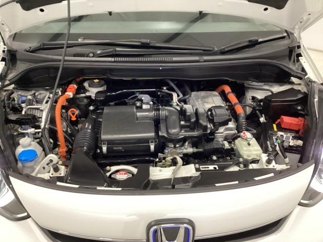 フィット e:HEVホーム 試乗車 メモリーナビ ドラレコ ETC 前後誤発進抑制機能 クリソナ 助手席エアバッグ 運転席エアバッグ アイドリングストップ 禁煙 LEDライト USB接続 バックカメラ ABS サイドエアバッグ(21枚目)