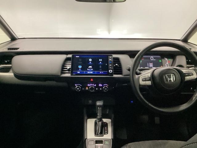 フィット e:HEVホーム 試乗車 メモリーナビ ドラレコ ETC 前後誤発進抑制機能 クリソナ 助手席エアバッグ 運転席エアバッグ アイドリングストップ 禁煙 LEDライト USB接続 バックカメラ ABS サイドエアバッグ(26枚目)